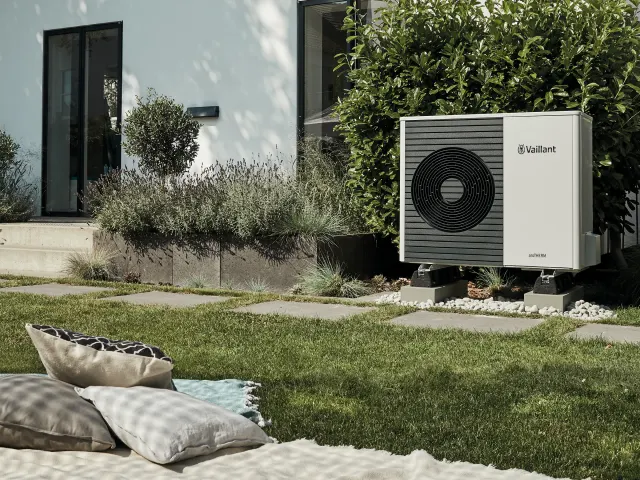 Compact heat pump unit in a garden